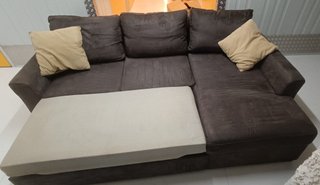 Sofá chaise longue con cama y almacenaje