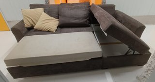 Sofá chaise longue con cama y almacenaje