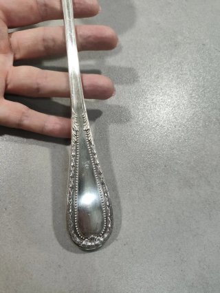 Cucharón antiguo de alpaca plateada