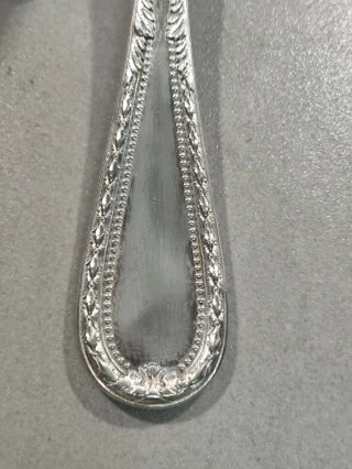 Cucharón antiguo de alpaca plateada