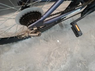Bicicleta Morada y Plateada.