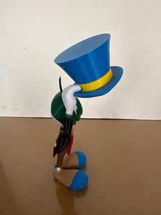 Figura Pepito Grillo con sombrero y paraguas