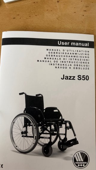 Silla ruedas manual. Y reposapies izquierdo.
