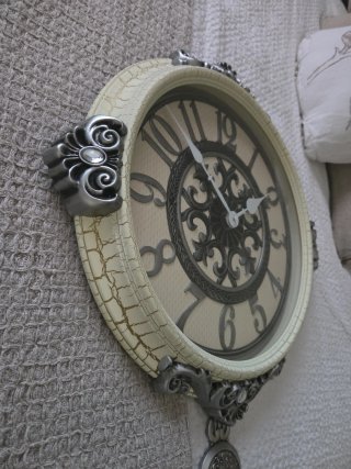 Reloj de pared decorativo con péndulo