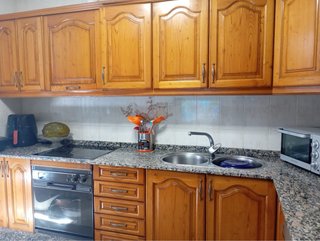 Muebles de cocina madera y cristal