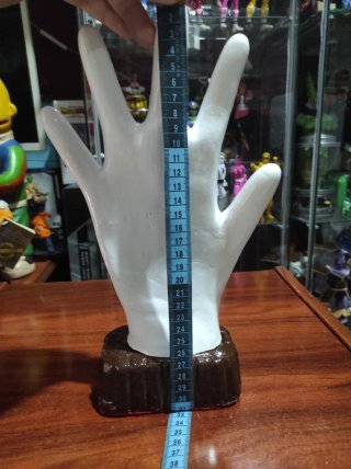 Escultura mano