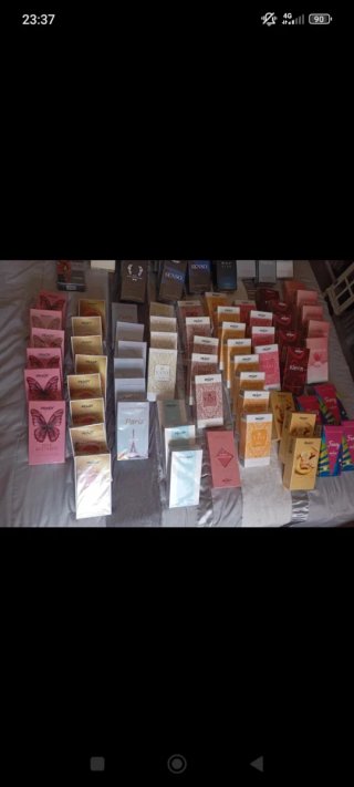 Lote 100 Perfumes Prady Mujer y Hombre