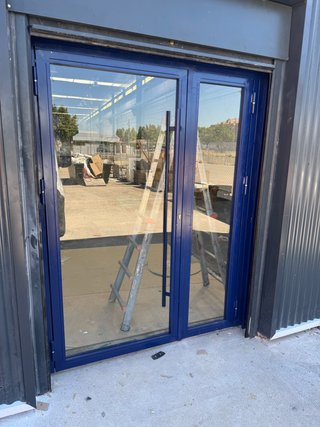 Puerta hierro dos hojas