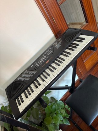 Teclado musical con soporte y banqueta