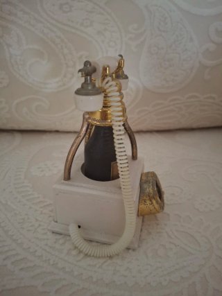 Accendino vintage telefono oro