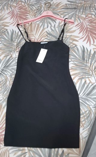 Vestito nero con bretelline gioiello