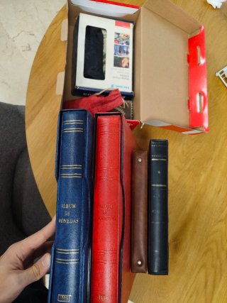Collezione di monete con album