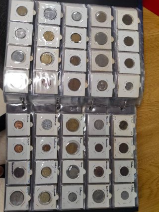 Collezione di monete con album