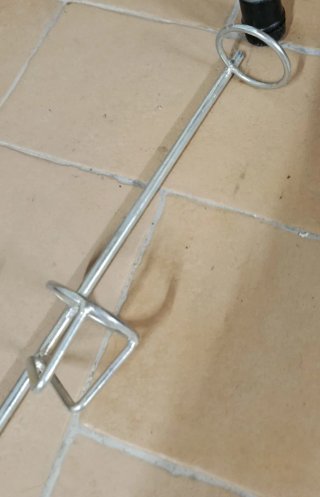 Caña de pescar con carrete y funda