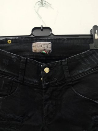 Jeans skinny neri strappati donna