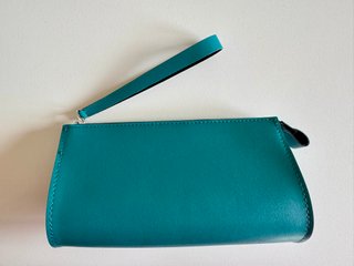 Pochette borsa con cerniera e cinturino da polso