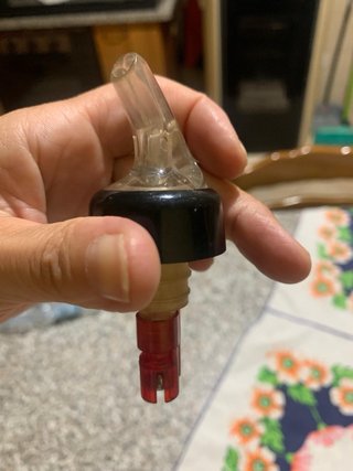 Versatore dosatore per liquore in plastica