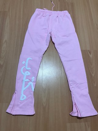 Pantalón rosa con cremalleras