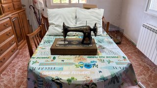Máquina de coser Singer restaurada, 100 años