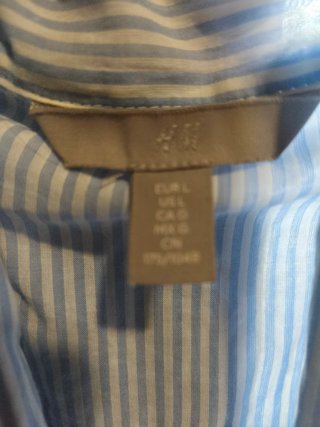 Camisa elegante con lazada rayas