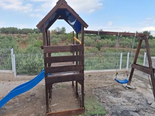 Parque infantil madera con tobogán