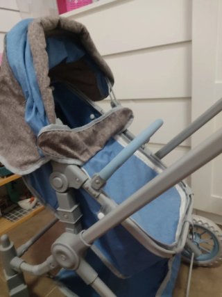 Cochecito de muñecas azul y gris