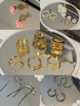 Lote de pendientes y anillos dorados y plateados