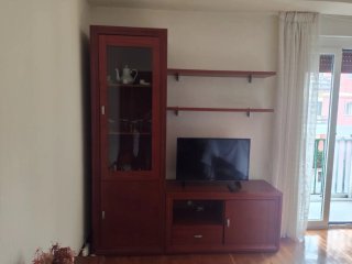 Mueble de salón madera y cristal
