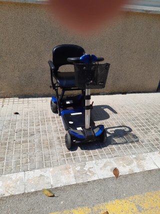 Scooter plegable con mando buen estado