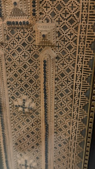 Cuadro de punto de cruz religioso antiguo