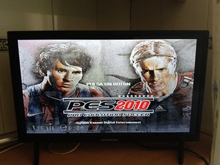 PlayStation 2 Slim + 3 Giochi