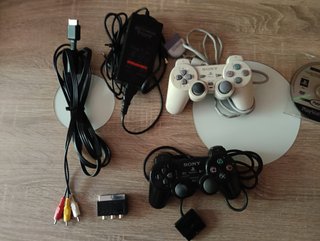 PlayStation 2 Slim + 3 Giochi