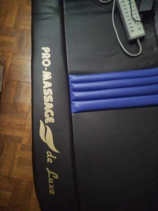 Colchoneta de masaje con calor y vibración.