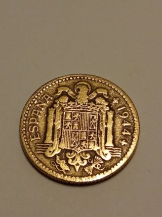 3 monedas de 1 Peseta española, acuñada en 1944.