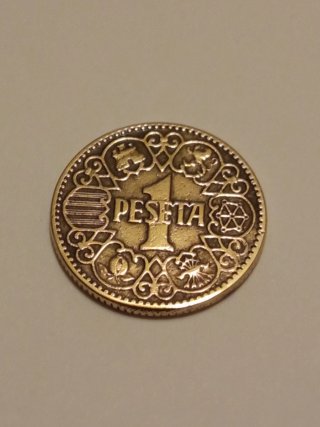3 monedas de 1 Peseta española, acuñada en 1944.