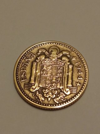 3 monedas de 1 Peseta española, acuñada en 1944.