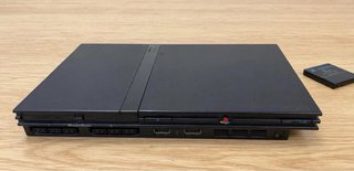 PS2 Slim Nera + Controller + 9 Giochi + Scheda Memoria