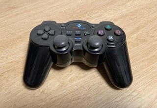 PS2 Slim Nera + Controller + 9 Giochi + Scheda Memoria