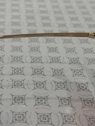 Gafas de sol Ray-Ban doradas y rosas