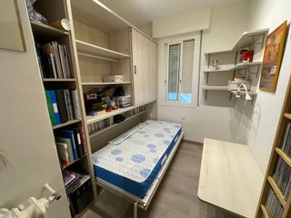 Habitación juvenil: Cama abatible+varios muebles