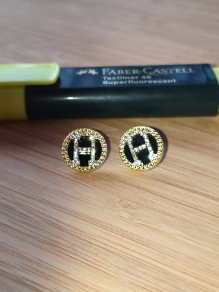 Pendientes H de Hermès Dorados y Negros