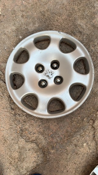 1 Tapacubos Peugeot 15