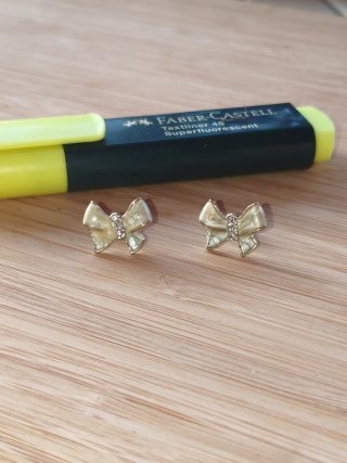 Pendientes lazo dorados con brillantes