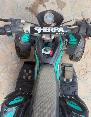 Quad eléctrico infantil Sherpa ATV para niños.