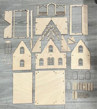 Casa de muñecas de madera