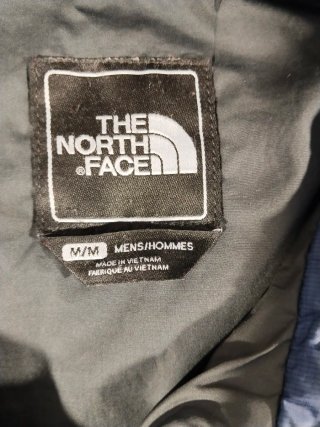 Chaqueta The North Face azul acolchada