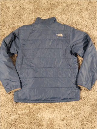 Chaqueta The North Face azul acolchada