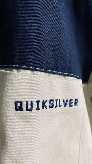 Camisa Quiksilver manga corta beige y azul