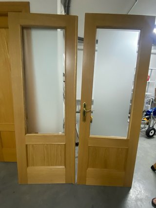 Puerta doble madera y cristal