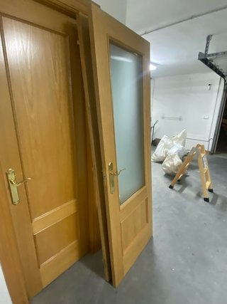 Puerta doble madera y cristal